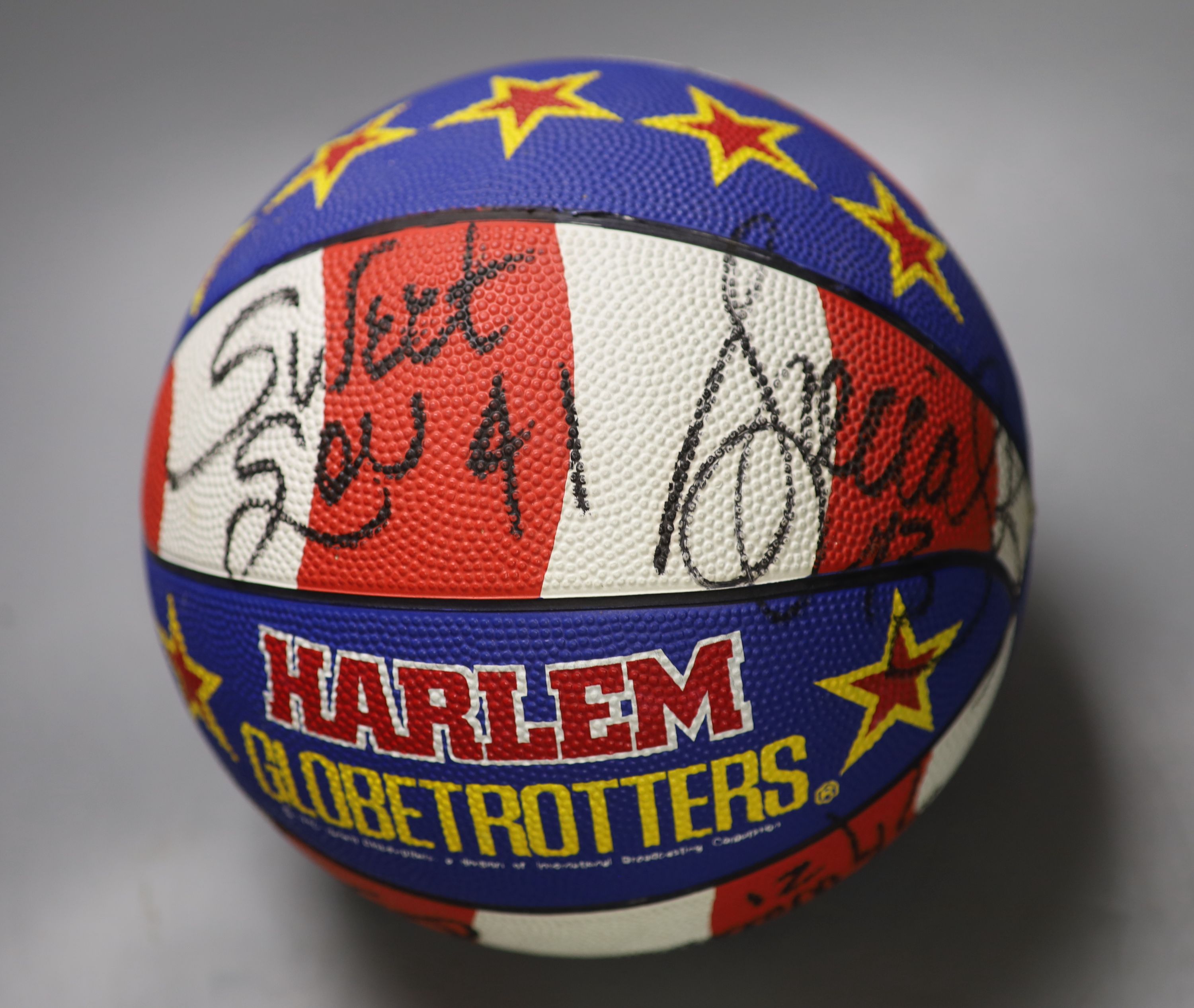 A Harlem Globe Trotters signed basketball